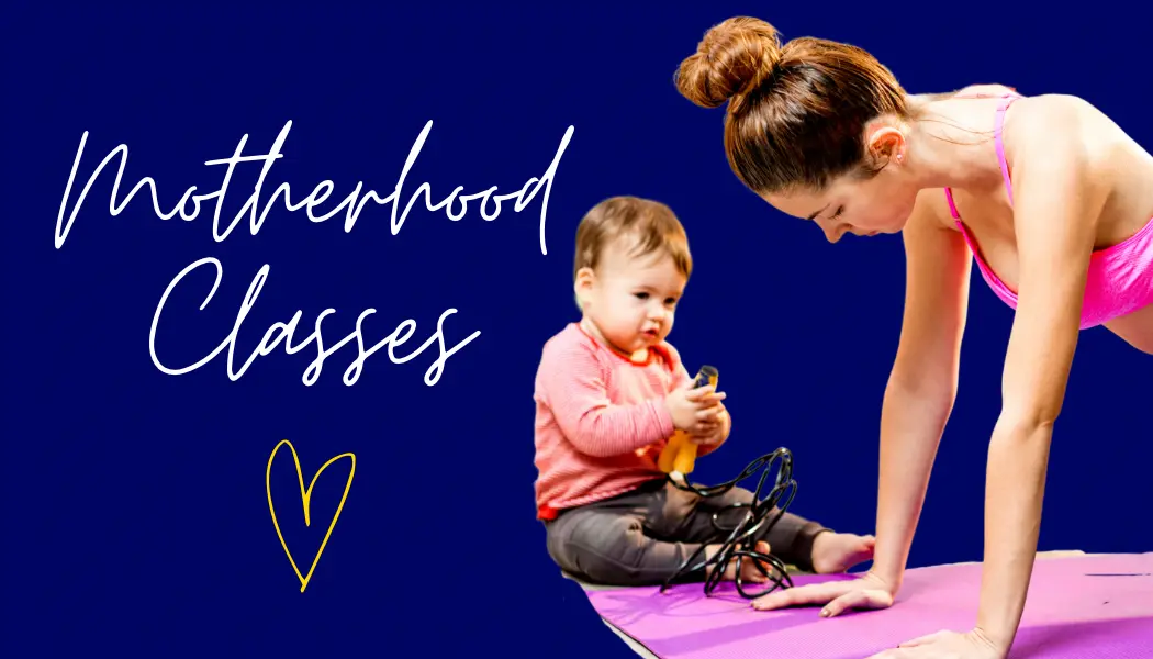 Mother exercising on mat with little one at Eir & Wild fitness class